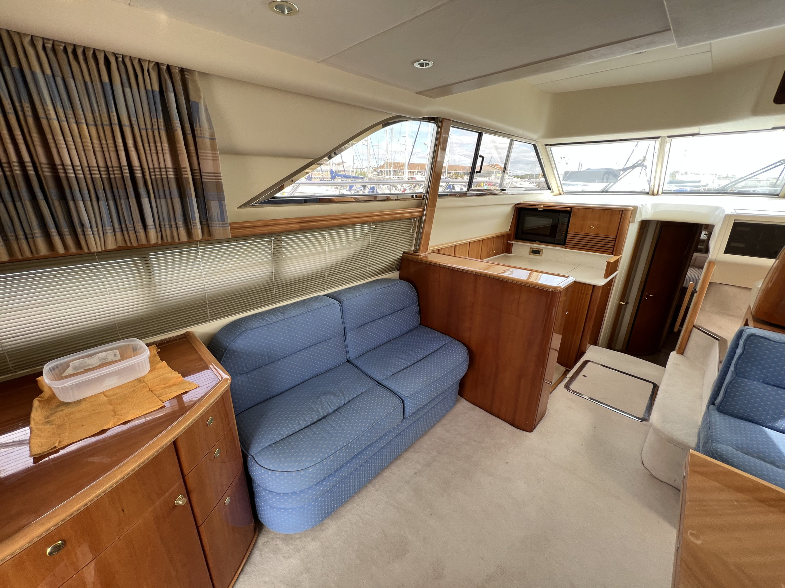 Princess 460 showing the saloon port-side sofa before refit