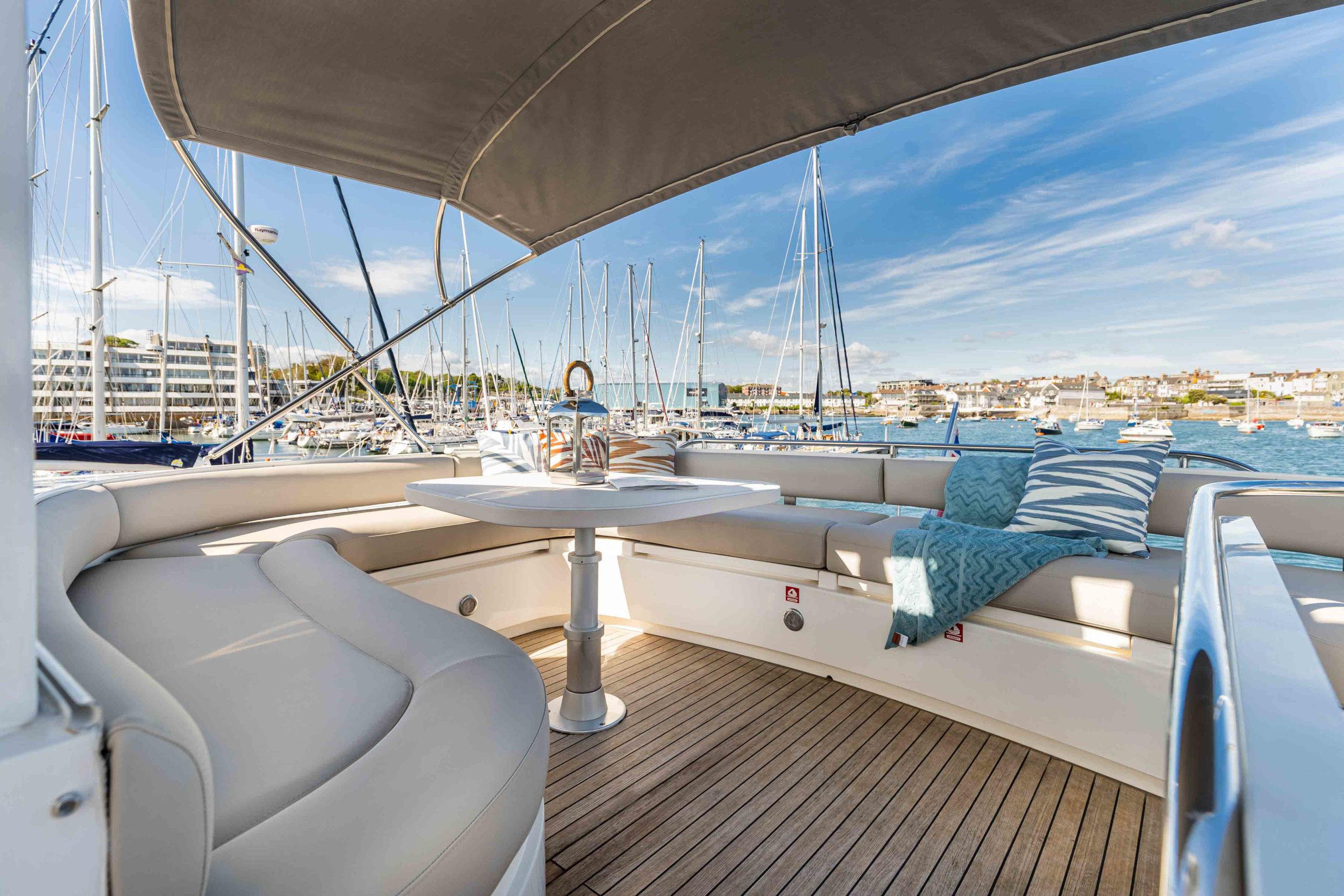 Modern exterior yacht deck in light greys and natural tones