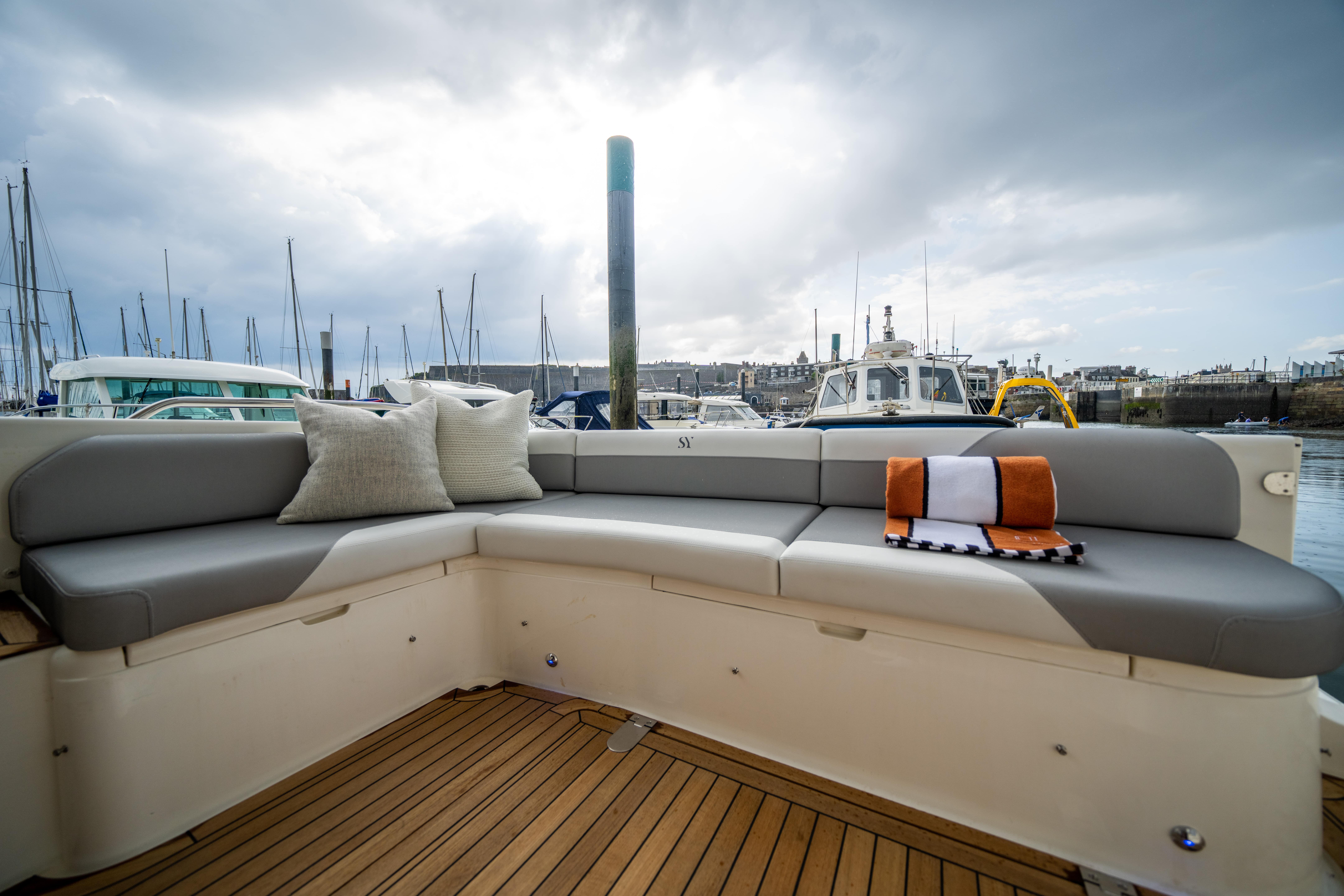 Princess 460 showing the cockpit with new teak and upholstery