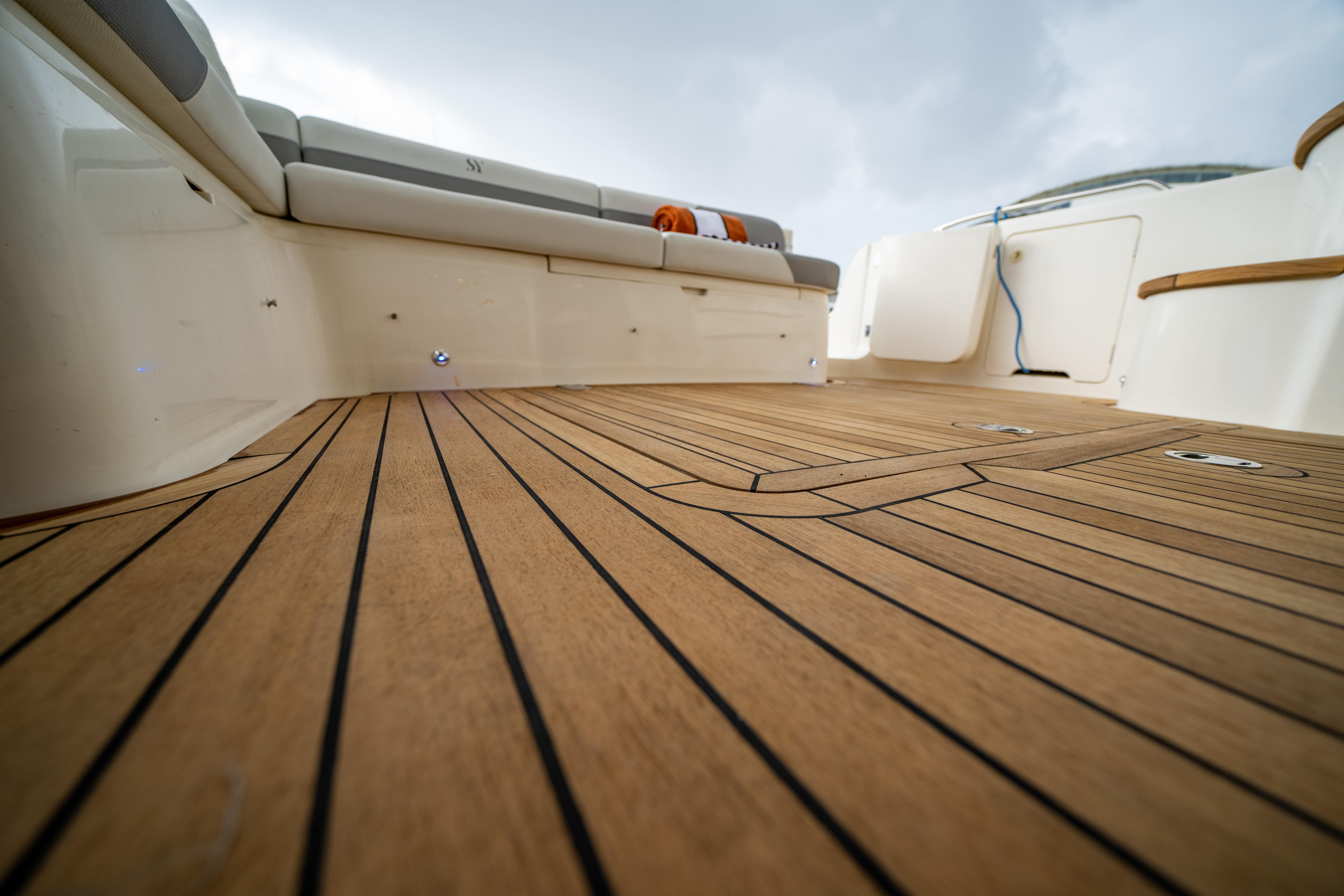 Princess 460 showing the cockpit with new teak and upholstery